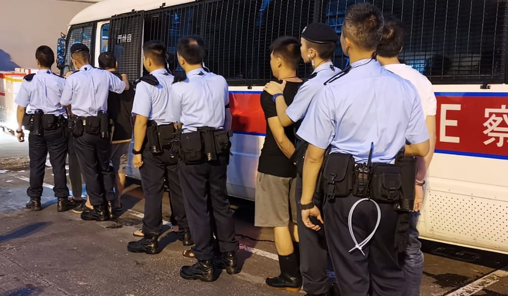 Some of the suspects picked up in the Cheung Sha Wan raid against illegal workers on Wednesday. Photo: HK Police