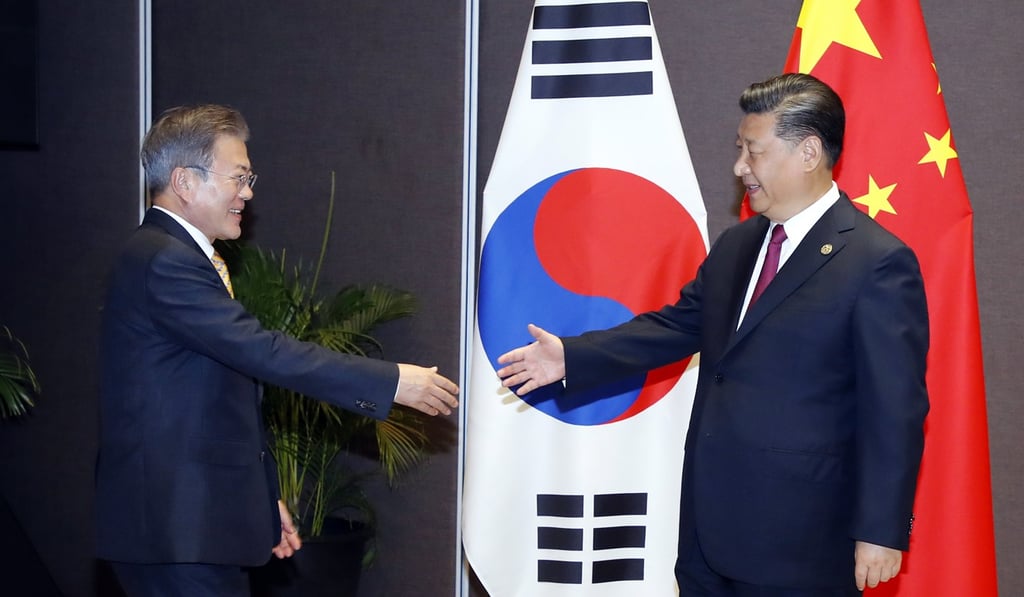 South Korean President Moon Jae-in and Xi Jinping at the Apec summit in November. Photo: EPA-EFE