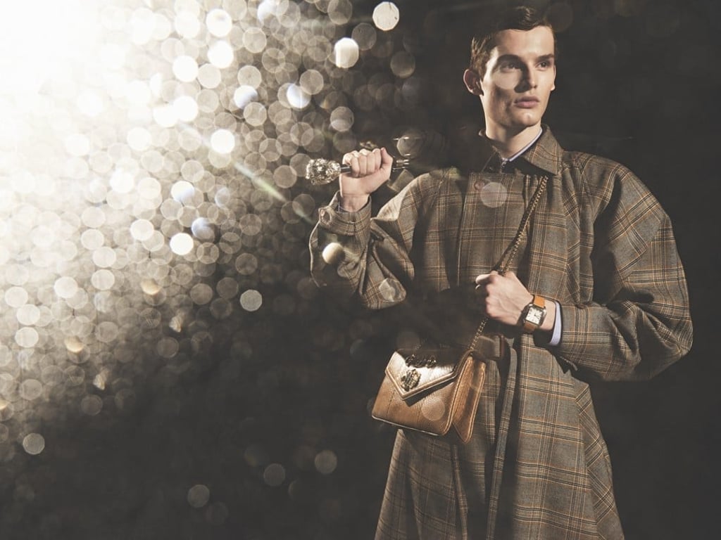Cartier Santos de Cartier in steel, HK$52,000; Gucci trench coat, HK$36,200; shirt HK$6,700; bag, price on request; Pasotti umbrella, price on request Cartier Santos de Cartier in steel, HK$52,000; Gucci trench coat, HK$36,200; shirt HK$6,700; bag, price on request; Pasotti umbrella, price on request