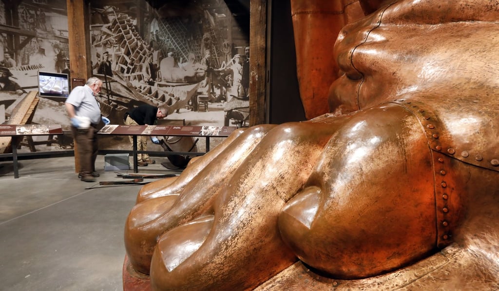 A full-scale model of the Statue of Liberty’s foot is among the artefacts at the museum. Photo: AP