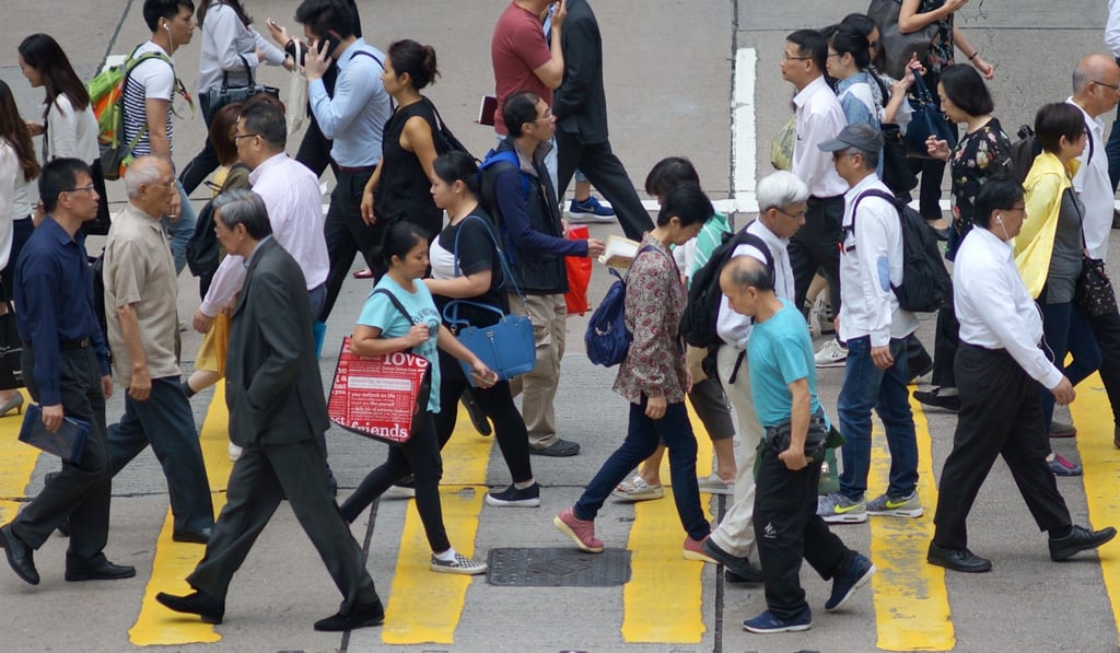 The strain of long working hours is a cause of family-related stress among parents, the survey shows. Photo: Fung Chang