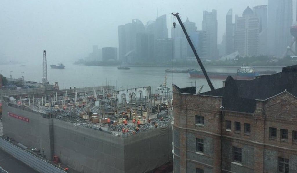 The demolition project on The Bund, Shanghai has been suspended, but not before one of the three historic buildings was demolished. Photo: Urban China magazine