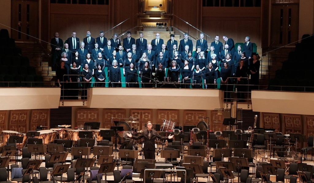 The Netherlands Radio Choir and chorus master Klaas Stok receive the applause of the Hong Kong Cultural Centre Concert Hall audience for their performance of two sacred motets by Bruckner. Photo: Ka Lam/HK Phil