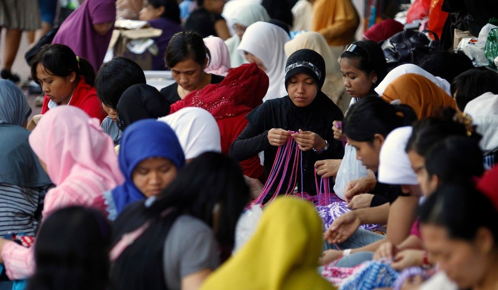 Many young Muslim women have a hefty yet subtle political presence on social media. Photo: AFP