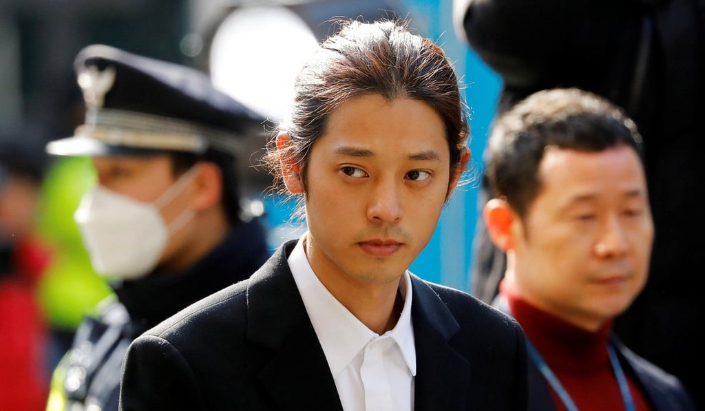 South Korean singer Jung Joon-young arrives for questioning by police in March on accusations of illicitly taping and sharing sex videos on social media. Photo: Reuters