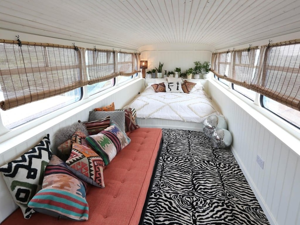 The upstairs bedroom of the Spice Bus can sleep up to three guests. The upstairs bedroom of the Spice Bus can sleep up to three guests.