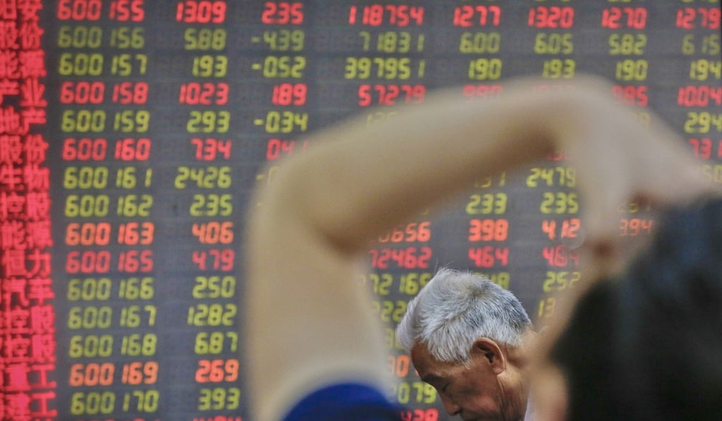 Chinese investors react as they monitor stock prices at a brokerage house in Beijing on May 14. The lack of a resolution to US-China trade talks has taken a toll on global stock markets. Photo: AP