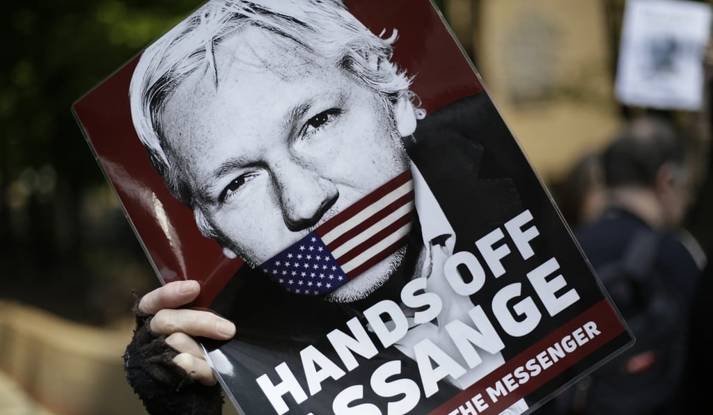 On May 1, protesters demonstrate outside court where Julian Assange will appear in London. Photo: AP