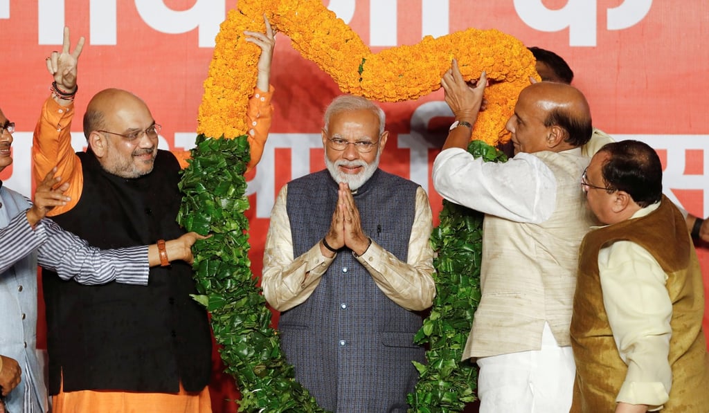 Indian PM Narendra Modi celebrates after the election results in New Delhi. Photo: Reuters