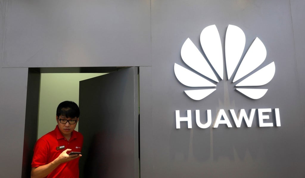 An employee at the Huawei flagship store in Bangkok on Thursday. Photo: Reuters An employee at the Huawei flagship store in Bangkok on Thursday. Photo: Reuters