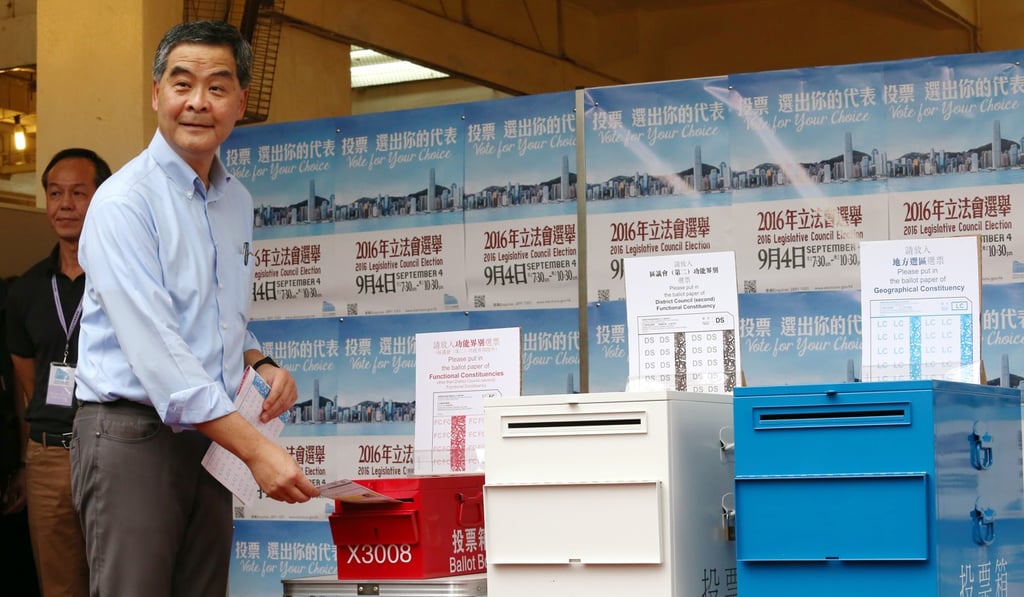 CY Leung was visiting a polling station when the sandwich was thrown at him. Photo: K.Y. Cheng