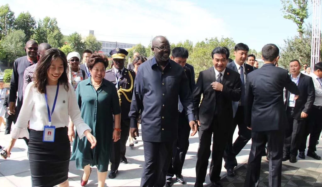 Liberian president George Weah during his visit to Henan Ruimei Hair Product in Xuchang. Photo: Handout Liberian president George Weah during his visit to Henan Ruimei Hair Product in Xuchang. Photo: Handout
