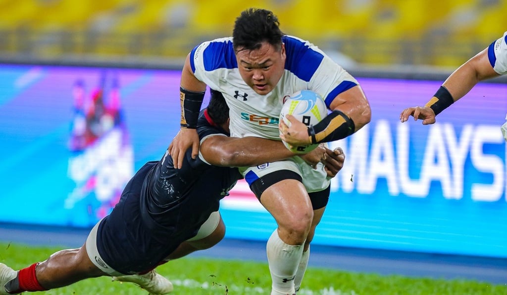 South Korean prop and captain Na Kwan-young rumbles down the line for a try against Malaysia. Photo: Asia Rugby