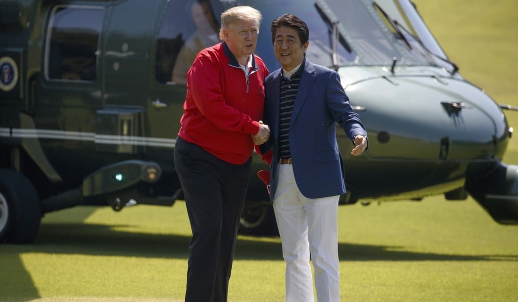 President Donald Trump meets with Japanese Prime Minister Shinzo Abe before playing a round of golf at Mobara Country Club. Photo: AP President Donald Trump meets with Japanese Prime Minister Shinzo Abe before playing a round of golf at Mobara Country Club. Photo: AP