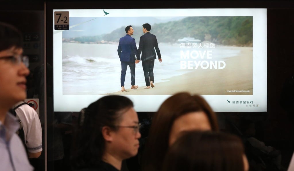 This Cathay Pacific advert, seen here at the MTR station in Central, triggered a gay rights storm after it was initially barred from display. Photo: Dickson Lee