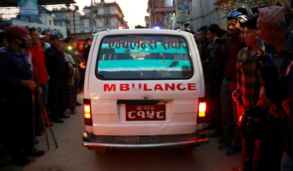 An ambulance leaves an explosion site in Kathmandu, Nepal. Photo: Reuters