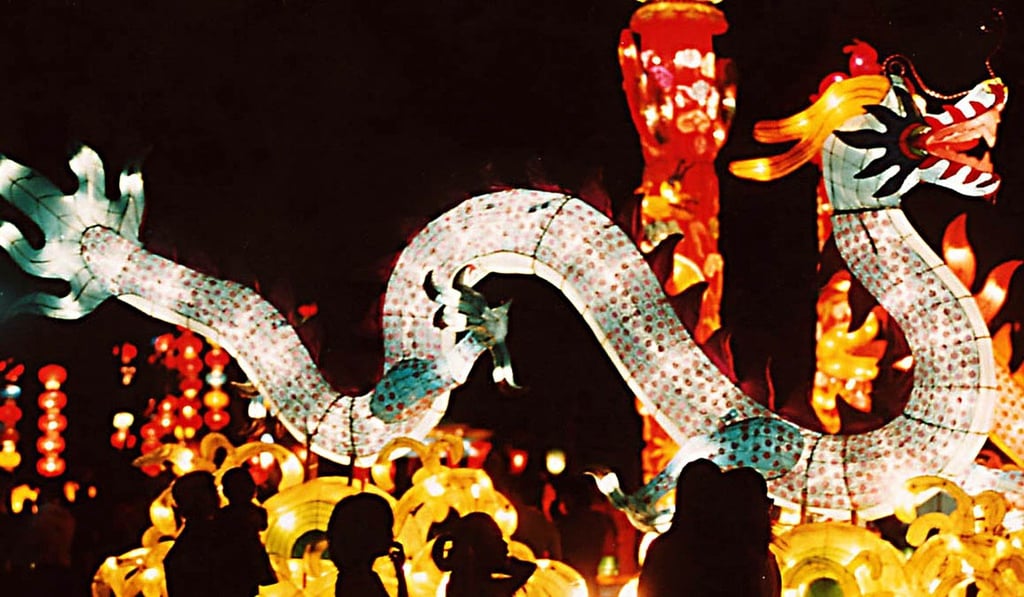 Chinese Indonesian families take part in a dragon dance to mark Lunar New Year in Medan, Indonesia. Photo: AFP