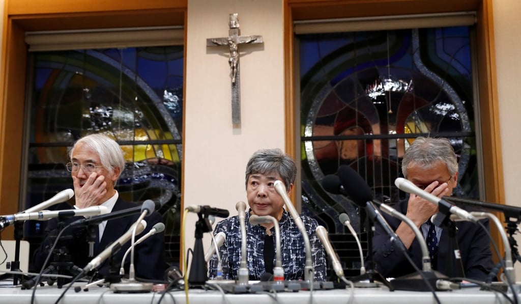 Tetsuro Saito, head of Caritas Gakuen School group, Teiko Naito, head of Caritas Gakuen Elementary School, and assistant principal Satoru Shitori, speak to the press after the stabbing. Photo: Reuters
