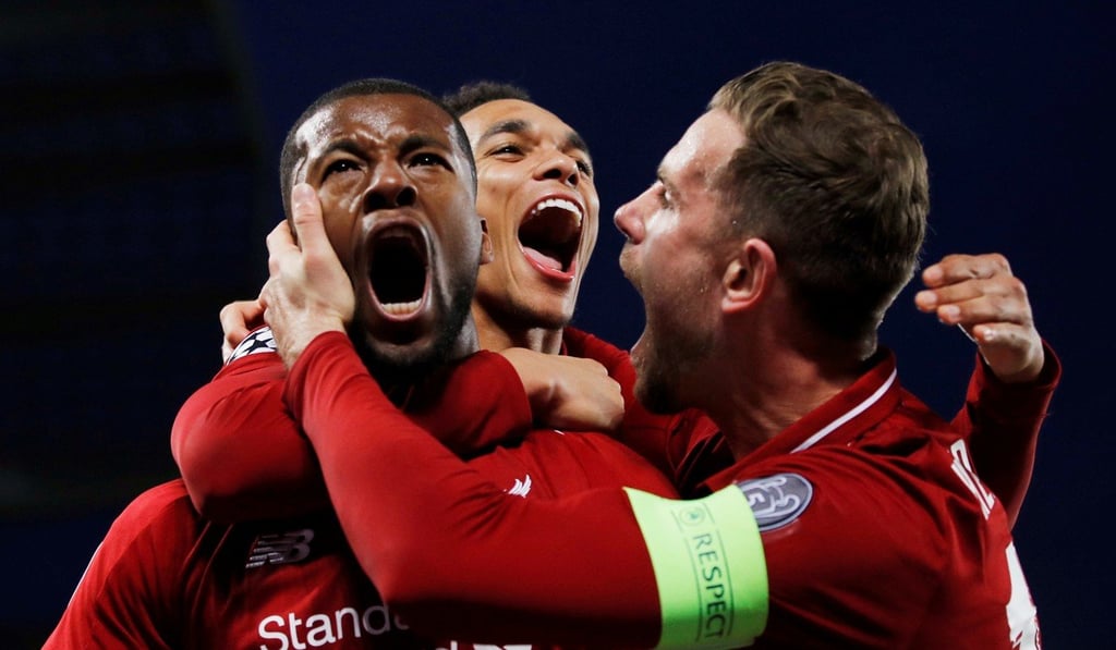 Liverpool's Georginio Wijnaldum celebrates scoring with Jordan Henderson and Trent Alexander-Arnold. Photo: Reuters