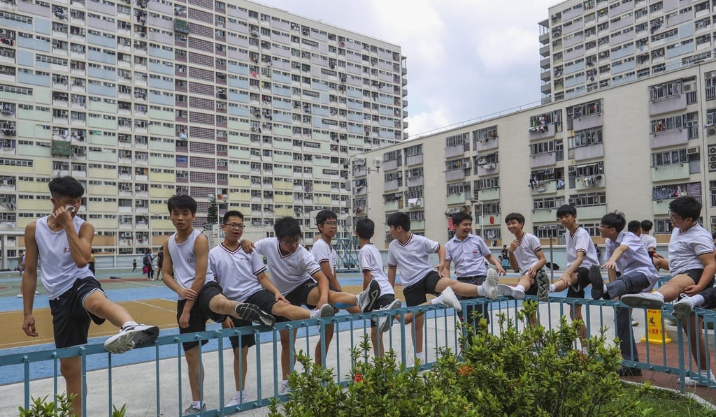Students exercise at the court of Choi Hung Estate. Experts are asking parents and others to keep an eye on signs that children may be struggling, such as losing interest in activities. Photo: Edmond So