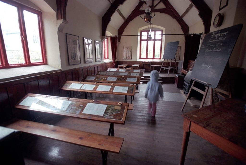 The old school in the abandoned village of Tyneham, in Dorset, England. Photo: Alamy