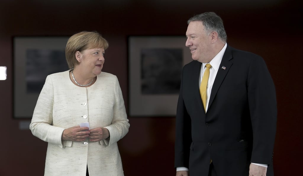 German Chancellor Angela Merkel, left, and US Secretary of State, Mike Pompeo. Photo: AP Photo