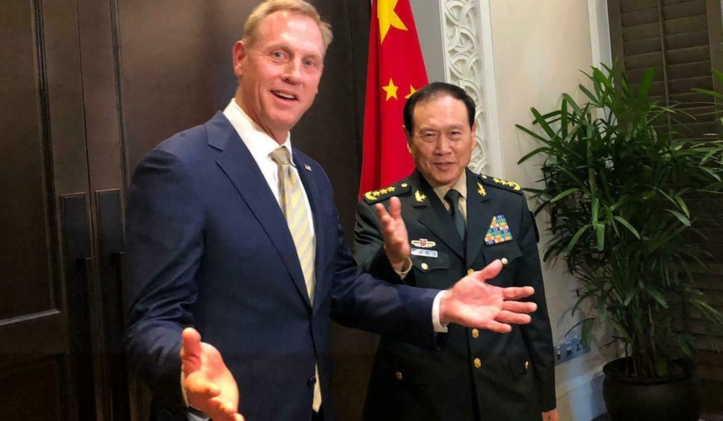 Patrick Shanahan meets Wei Fenghe on the sidelines of the Shangri-La Dialogue on Friday. Photo: AP