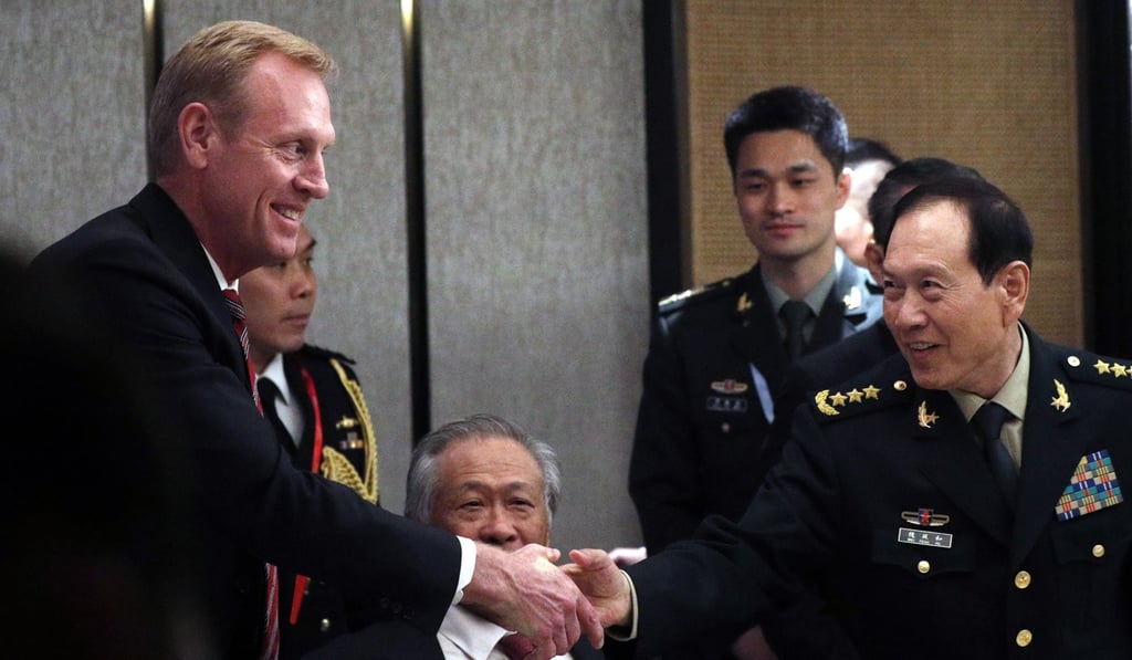 Acting US defence secretary Patrick Shanahan shakes hands with China’s Defence Minister General Wei Fenghe on the sidelines of the Shangri-La Dialogue. Photo: EPA-EFE Acting US defence secretary Patrick Shanahan shakes hands with China’s Defence Minister General Wei Fenghe on the sidelines of the Shangri-La Dialogue. Photo: EPA-EFE