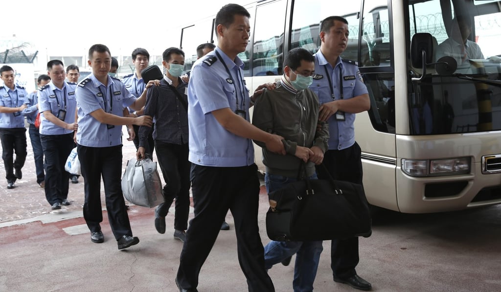 Six fugitives involved in economic crimes are taken back to China from Indonesia by Operation Fox Hunt in 2015. Photo: Xinhua