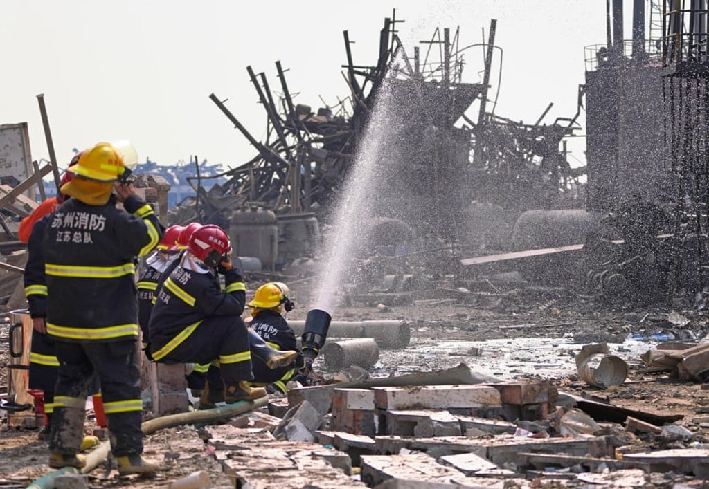 Firefighters on the rubble of a pesticide plant owned by Tianjiayi Chemical following an explosion in Xiangshui county, Yancheng, Jiangsu province on March 23, 2019. Photo: Reuters