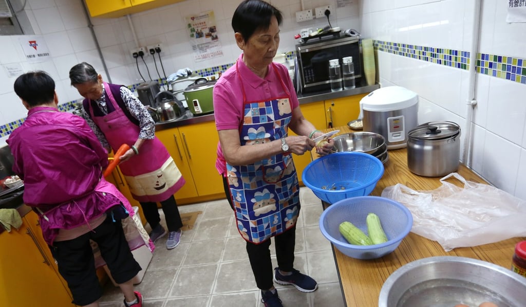 Members of the Super GoldenAge volunteer team prepare food. Photo: Jonathan Wong