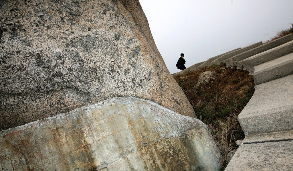 Hong Kong’s stair cases present a unique challenge for runners when they are wet. Photo: Jonathan Wong