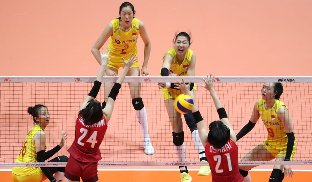 China’s Yuan Xinyue (centre) shows her powerful spiking against Japan. Photo: K. Y. Cheng