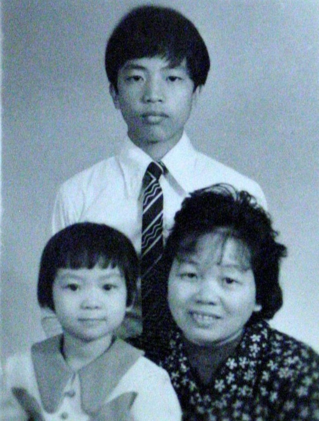 Young Jean (front left) with brother Kwan (back) and her mother. Young Jean (front left) with brother Kwan (back) and her mother.
