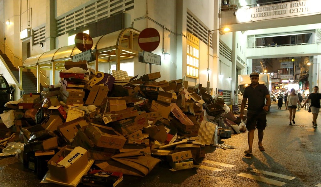 Discarded cartons are dumped outside a market on Bowrington Road. Photo: Edmond So Discarded cartons are dumped outside a market on Bowrington Road. Photo: Edmond So