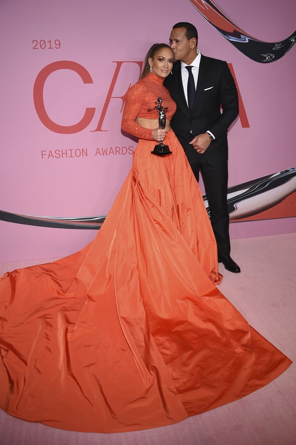 jennifer lopez in orange dress Jennifer Lopez Re-Wore an Orange Sherbet Midi Dress From 2016