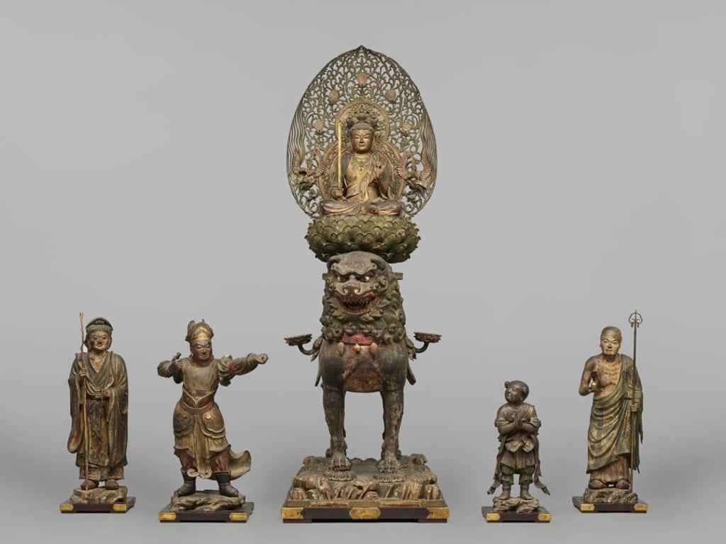 Monju Bosatsu Seated on a Lion, with Standing Attendants. Photo: Tokyo National Museum