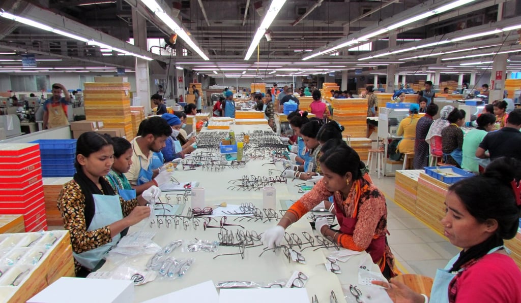 Workers make eyeglasses at a factory owned by a Hongkonger in Bangladesh’s Uttara Export Processing Zone. Photo: Phila Siu