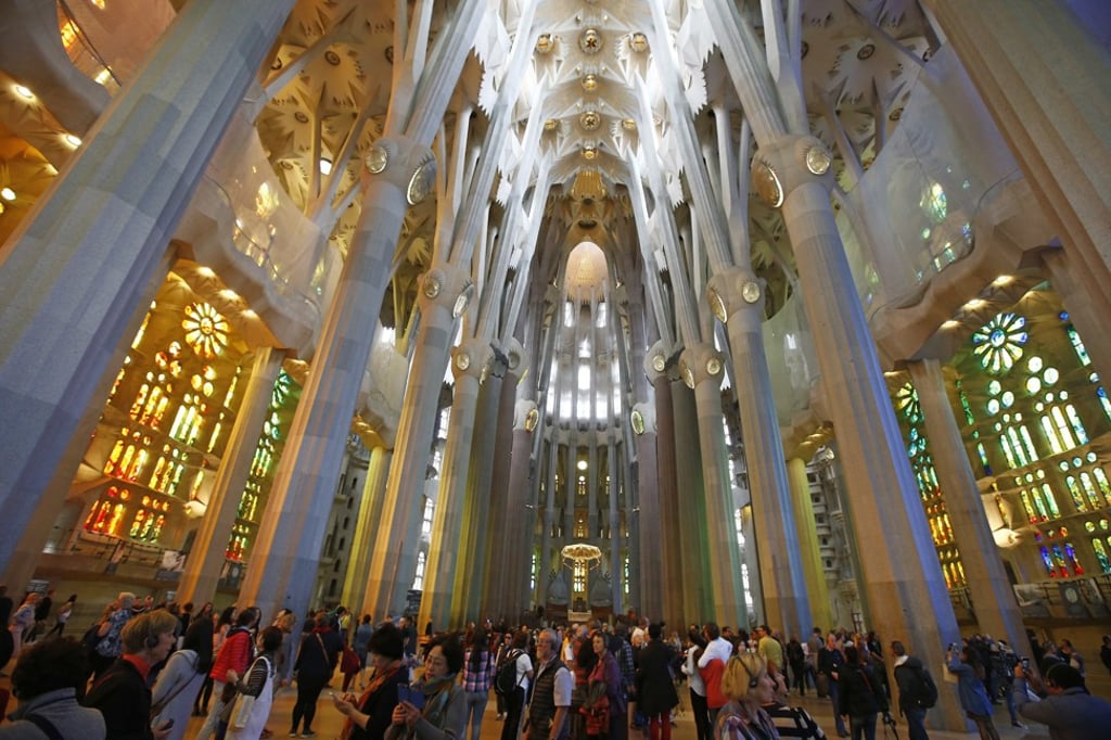 Tourists visit the Sagrada Familia in Barcelona in October 2015. Photo: AP