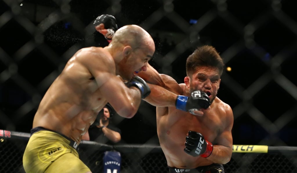 Marlon Moraes punches Henry Cejudo. Photo: AFP Marlon Moraes punches Henry Cejudo. Photo: AFP