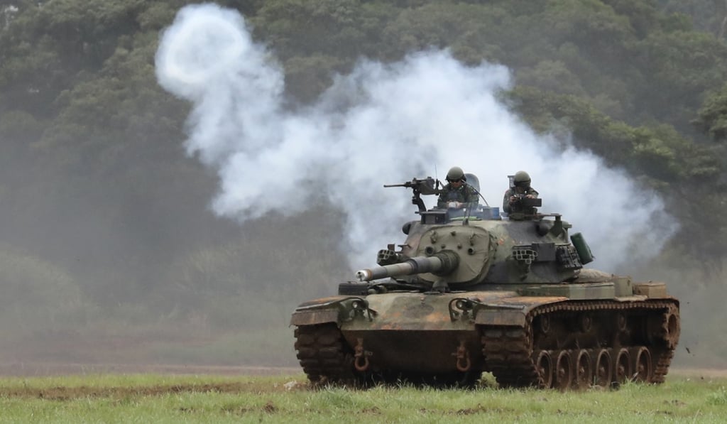 Taiwanese Soldiers on a CM11 battle tank, jointly developed with US arms manufacturer General Dynamics. Photo: EPA Taiwanese Soldiers on a CM11 battle tank, jointly developed with US arms manufacturer General Dynamics. Photo: EPA