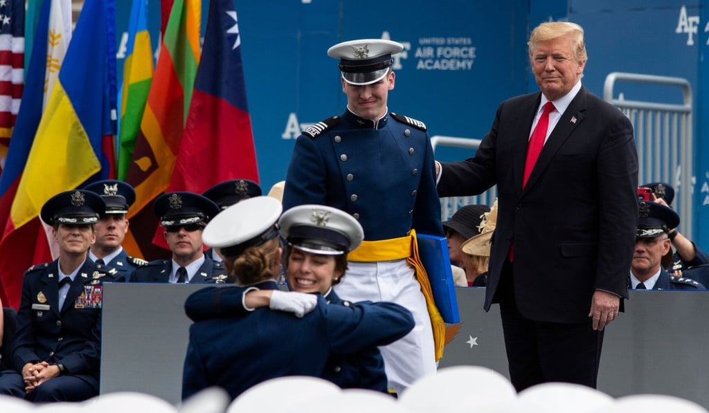 US President Donald Trump congratulates graduates, with Taiwan’s flag among those in the background, during a ceremony at the US Air Force Academy on May 30. Photo: AFP US President Donald Trump congratulates graduates, with Taiwan’s flag among those in the background, during a ceremony at the US Air Force Academy on May 30. Photo: AFP