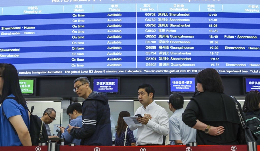 Passengers queue up to buy advance tickets at the West Kowloon terminus. Photo: Sam Tsang