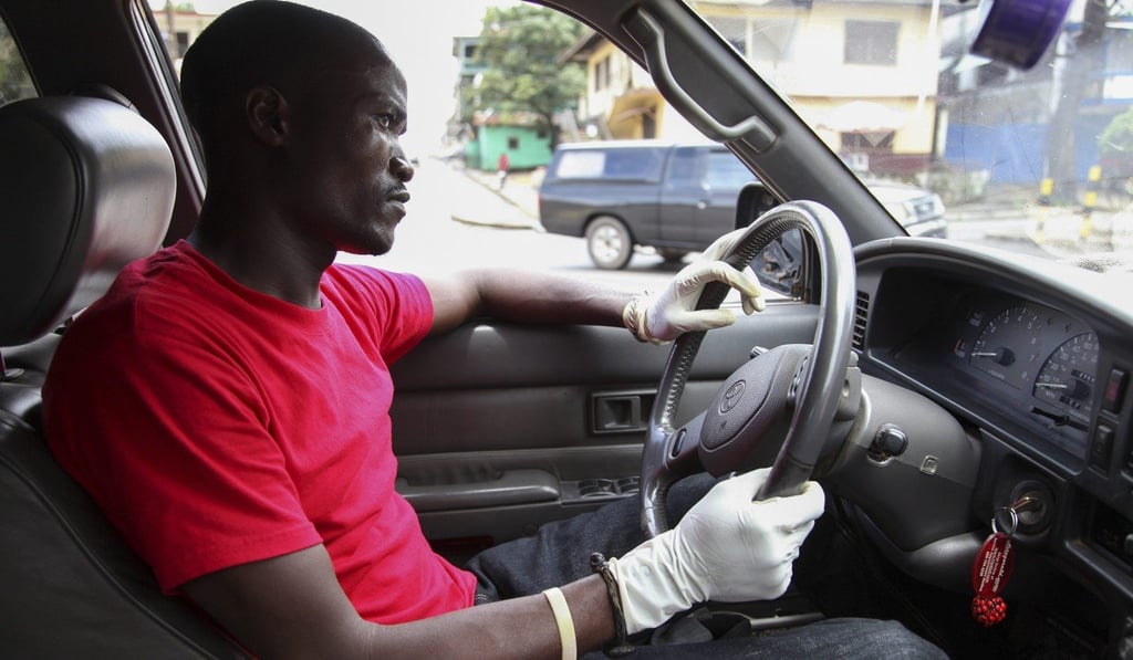 A taxi driver in Liberia, West Africa. A Singaporean start-up wants to launch a ride-hailing app in West African nations. Photo: EPA