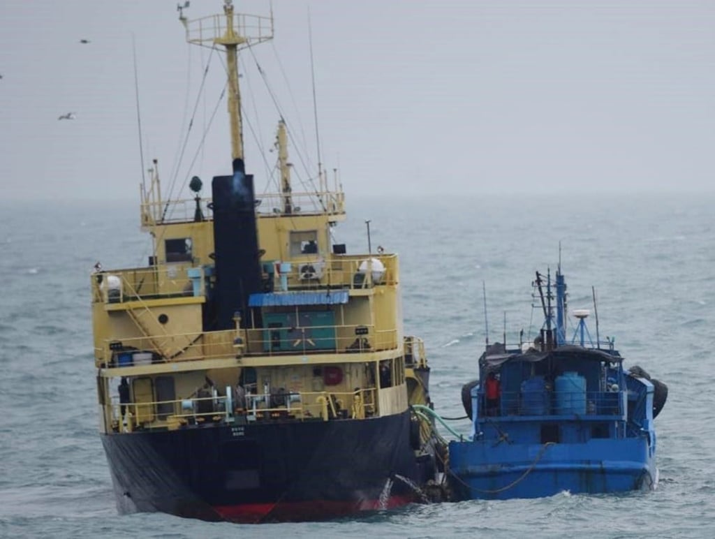 Japan says the photo shows North Korean-flagged tanker Yu Jong 2 (left) and the Min Ning De You 078 performing a ship-to-ship transfer in February 2018. Photo: AP