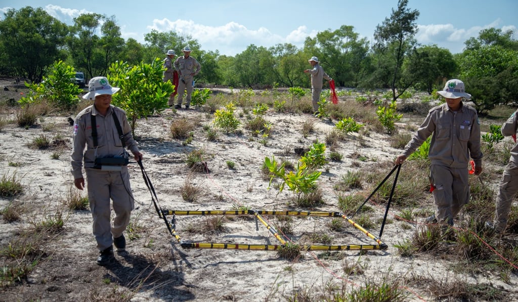 Mine clearance operators scan the land using a German-made large loop detector, which costs close to US$4,000 per set. Photo: Khairul Anwar Mine clearance operators scan the land using a German-made large loop detector, which costs close to US$4,000 per set. Photo: Khairul Anwar