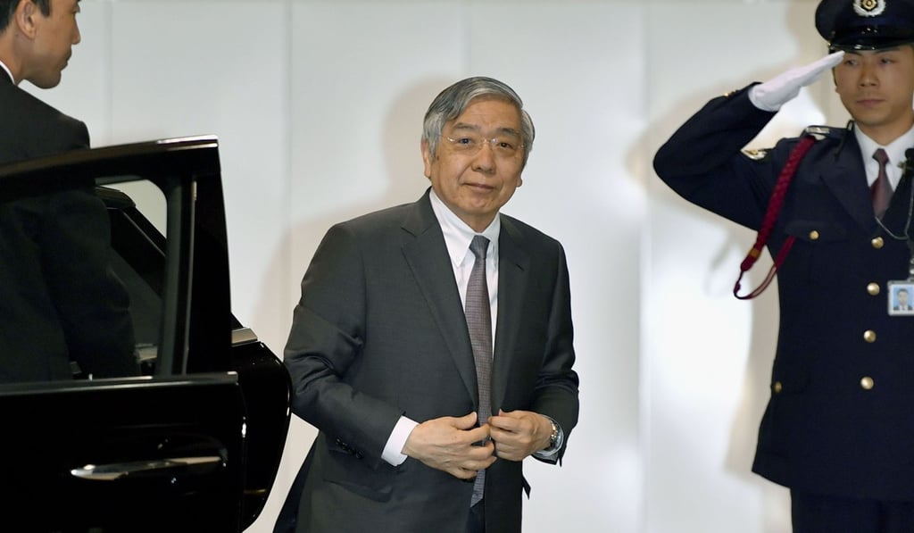 Bank of Japan governor Haruhiko Kuroda arrives at the central bank’s headquarters in Tokyo on April 25 for the second day of a two-day policy meeting. The bank later pledged to keep interest rates “extremely low”, at least until the spring of 2020 in a bid to underpin the economy. Photo: Kyodo