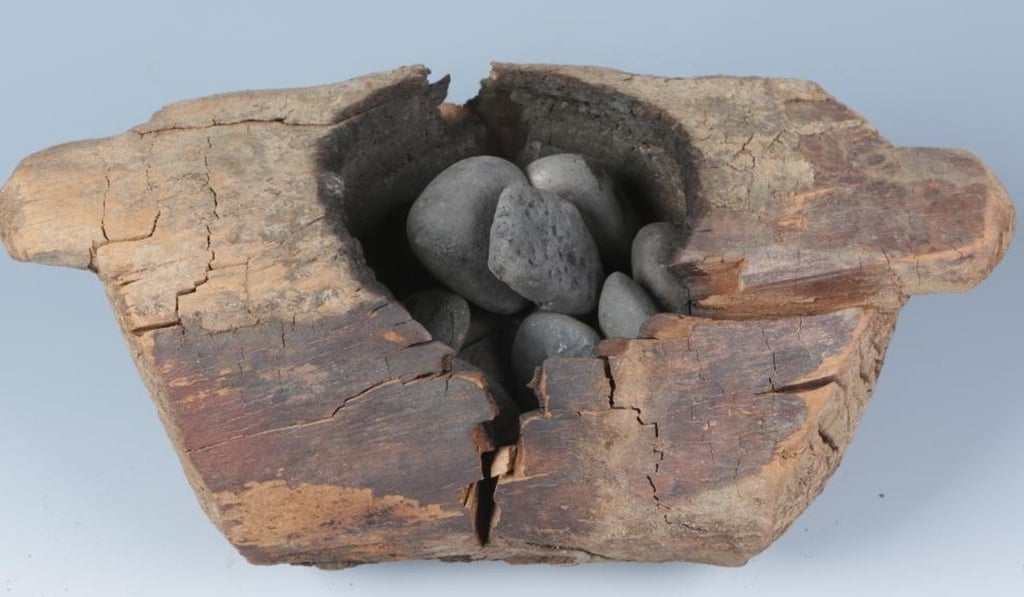 Scientists in Xinjiang found hemp had been burned on stones inside these wooden bowls 2,500 years ago. Photo: Chinese Academy of Sciences and Max Planck Institute