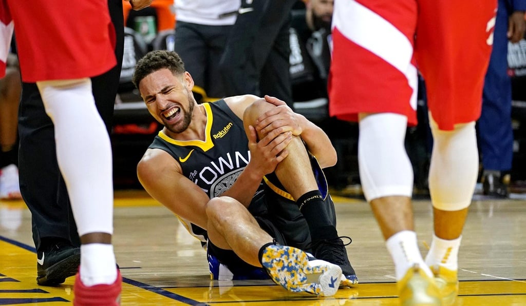 Klay Thompson clutches his knee after landing awkwardly. Photo: Kyle Terada-USA TODAY Sports Klay Thompson clutches his knee after landing awkwardly. Photo: Kyle Terada-USA TODAY Sports