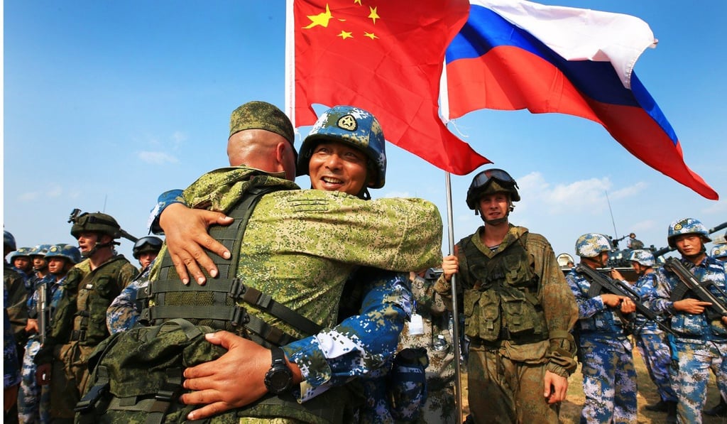 Chinese and Russian marines hug during a joint naval drill in Zhanjiang, Guangdong province in 2016. The two militaries are stepping up cooperation. Photo: Xinhua